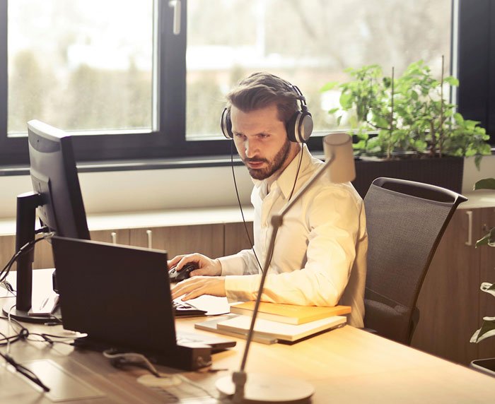 web designer on the phone helping a client